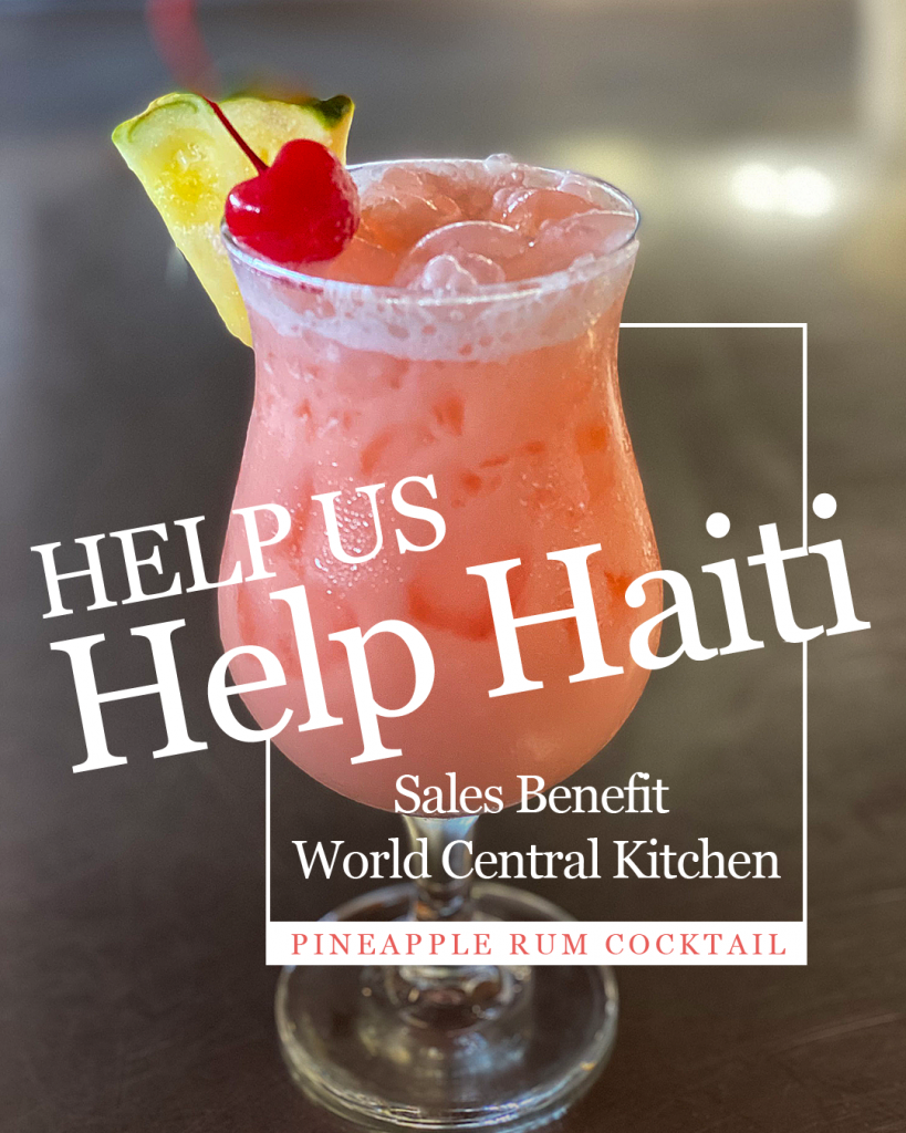 Photo of pineapple rum cocktail. Help us help Haiti sales benefit World Central Kitchen.